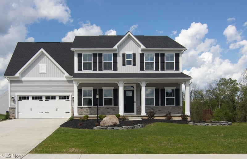Welcome to the Wedgewood Estates Community. This newly constructed home sits in a cul de sac. The exterior of the home features a stone and vinyl siding, newly landscaped yard and a beautiful front porch to enjoy those summer nights. As you enter the interior of the home the windows allow for natural light to shine on the open floor plan. The kitchen features a huge island with granite counter tops and built in dishwasher, great for hosting friends and family. As you make your way upstairs, you have a second floor laundry room, four bedrooms and two bathrooms. The master bedroom has a special touch of character with a shiplap wall, two walk-in closets and master bathroom with dual head showers. The development is located right across from the Medina Country Club. This home is in close driving distance to stores, parks, restaurants and more! Schedule your private showing today.