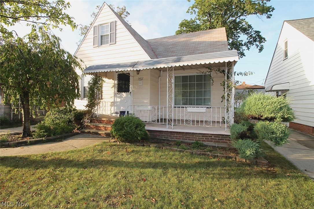 Freshly painted and ready for YOU. This three bedroom Bungalow welcomes you home with beautiful arched doorways as you enter the large living room area with recessed lighting flows nicely into the kitchen and eating area. You will find hardwood floors under the carpet throughout the home as well. The main floor bathroom has been recently remodeled (2017); spacious kitchen with eating area and plenty of storage. In 2010 there were many updates completed: A/C, High Efficiency Furnace, Newer Outlets throughout the home, painted exterior, newer side door and garage roof was installed. Upstairs offers a finished room which could be used as a fourth bedroom, craft area or another office. Ceiling fans throughout and tons of closet space. Newer faucets and light fixtures along with blinds and curtains. Partially finished basement with a wet bar and sitting area; great for entertaining or just a place to hang out and lifetime waterproofing and glass block windows. There is also a workshop
