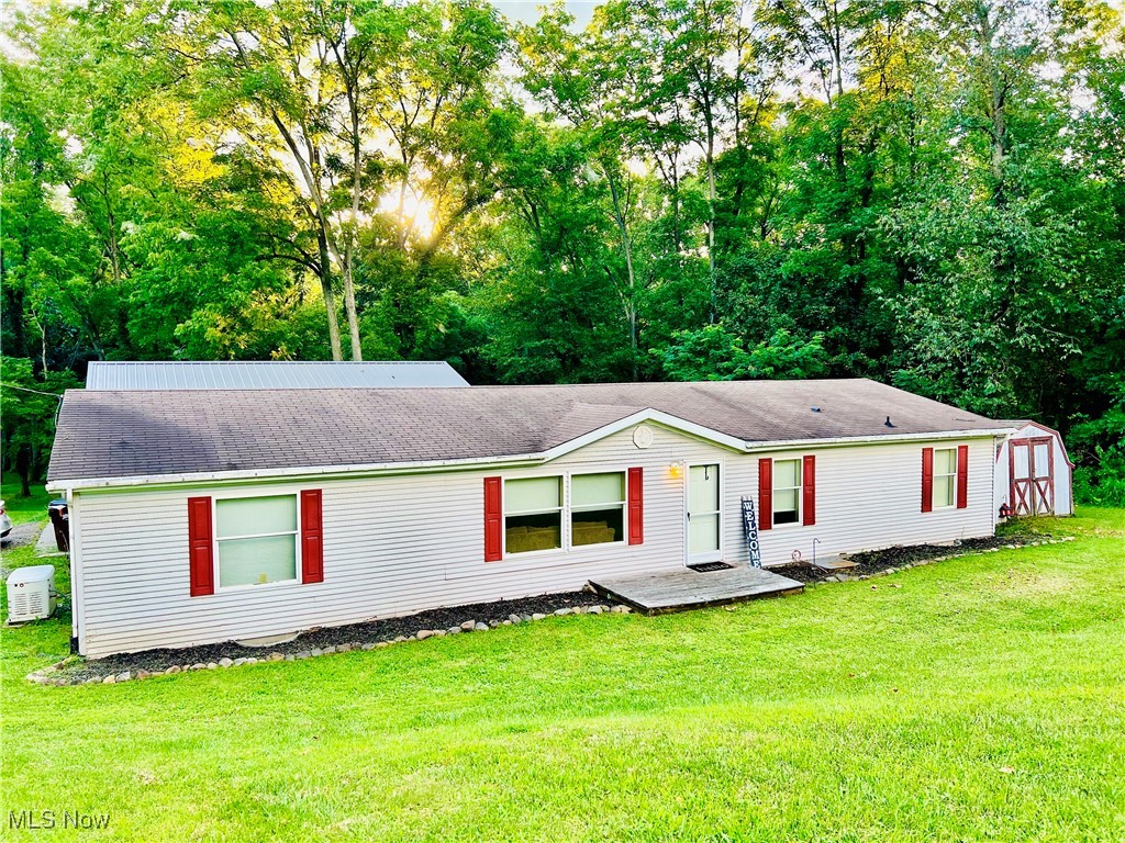 This spacious secluded move in ready Home has the best of both worlds!! Nestled on 4 acres but yet close to town and Intel. This well-kept 3 bedroom 2 bath manufactured home offers 1680 sqft with plenty of room for your family to grow. The Bonus room is the heart of the home with a cozy wood-burning stove. The roomy master bedroom has a large walk in closet and Master bath with a soaking tub and a stand up shower. This home has been freshly painted, A water filter system has been installed. Another great feature of this property is the spacious 30x20 garage with plenty of storage space . Another bonus feature is a whole-house generator! The property has a large private backyard with a creek flowing through the woods and lots of wildlife to watch, Property has been converted to Real Estate, Only minutes away from Kenyon College and Athletic center. Schedule your showing Today!