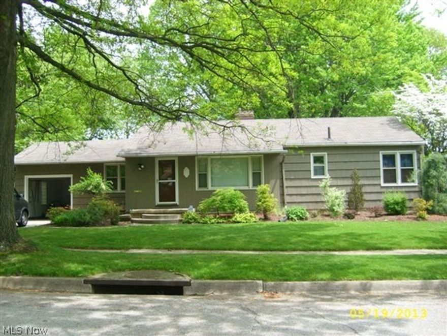 Just a wonderful 3 bedroom, 2 full bath ranch in the heart of Firestone Park. This home features tons of natural lighting, hardwood floors and natural woodwork throughout. A large eat-in kitchen and all appliances, updated kitchen countertops, floor, sink, back splash, faucets and under cabinet lighting.  Updated main bath with corian vanity, new surround, floor and commode.  Family room in basement with a wet bar and fireplace, has been water proofed with a transferable warranty. New windows, glass block in basement, new furnace, A/C.  This home sits on a double lot with beautiful landscaping. Home Warranty. It's a must see!