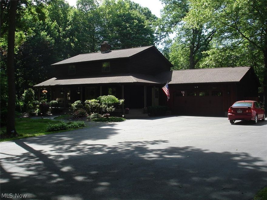 Spectacular 4 Bedroom Colonial with Pride of Ownership and updates throughout. First floor features wood plank ceilings, kitchen with newer Frigidaire Gallery appliances, reverse osmosis water system and butcher block island, LR has hardwood floor, brick fireplace and built in bookshelf, half bath, heated mud room w/refrigerator, office/den, Dinette that leads to wrap around back deck. Second floor has 4 Bedrooms, updated bath, laundry chute, and whole house fan. Master BR has private master shower and vanity. Full Walk-Out Basement with 26x13 finished Rec Room and wood burning stove. Walk-out leads to 2 car attached garage with built-in counters and cabinets perfect for workshop. Nestled in 4.2 wooded acres enjoy a fenced in backyard paradise w/ gorgeous inground pool and 33x8 wrap around deck. C/A, Fantastic Front Porch and plenty of parking are just some of the extra features that make this home special.