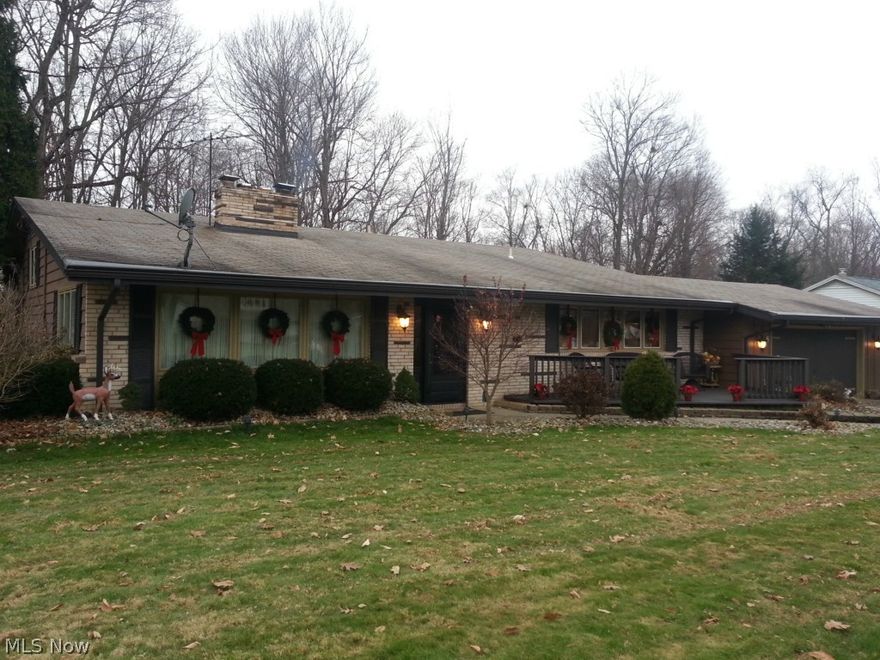 One of a kind!! Beautiful raised split level on 1/2 acre Park-like lot. This gracious home offer, sprawling deck overlooking the back yard, walkout basement to concrete patio plus additional deck (12x17), huge kitchen with beautiful cabinets surrounded by granite countertops with back splash, built in appliances, 2 fireplaces, 3 large bedrooms, 3 full baths, balcony off of master bedroom, cedar closet, extra storage. This home has so many additional amenities that you must see to appreciate. Roof is 14 yrs old, hot water tank 8 months old, furnace is approx 16 yrs. old.