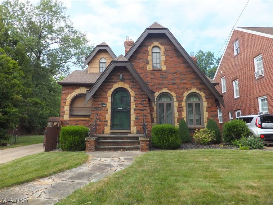 Just move-in BRICK & STONE CAPE COD located on 2 well maintained lots in a tucked away super area of Old Brooklyn,hardwood floors,natural woodwork,leaded cabinets,original wood interior doors,remodeled eat-in kitchen w/appliances staying, formal dining room w/corner leaded cabinets,living room w/gas fireplace & side porch,large 1st floor master bedroom,2 bedrooms up w/nursery off one,1/2 bath on 2nd floor,newer windows,updated 100amp electric box,glass block windows,central air,2 car garage w/opener,storage shed,complete fenced yard