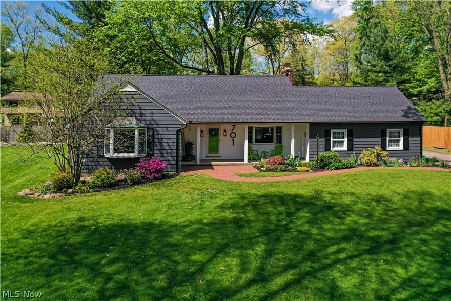 Almost an acre of Charm located close to Fairlawn Heights. All the large ticket items are newly done in the last four years. Outdoor paint, new roof, new furnace, new air conditioner, gutter with leaf guards. Main floor brand new hardwood flooring, skylights in the family room. Custom lighting made by whisker lighting w/Akron glasswork globes. Plenty of charm through the home including wainscoting in the dining room. Put this on your must see list. Detached second garage with potential workspace for homebased business.