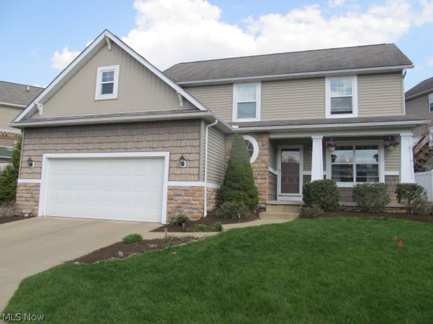 Attractive 3 bedroom 2.5 bath Ellet Colonial. Built in 2003. One owner home. Inviting foyer. Formal dining room. Eat in Kitchen with lots of cabinet space. Spacious living room with gas fireplace. Large Master bedroom with vaulted ceilings, walk in closet & master bath with double sinks. Neutral décor. Finished Rec Room in lower level adds additional living space. 2 car attached garage. Backyard has concrete patio, perfect for entertaining. This development offers maintenance free living and is conveniently located. Just move in and Relax!