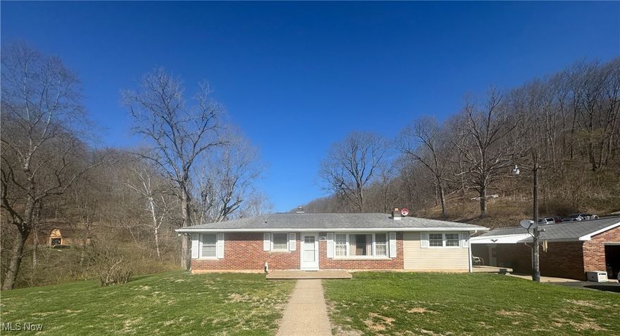 Charming Ranch-Style Home sitting on 1.5 acres. This beautifully maintained 3-bedroom, 1.5-bath ranch-style home that perfectly blends comfort and convenience. Step inside to discover a spacious and inviting living area, ideal for relaxing or entertaining guests. The heart of the home features a kitchen with handmade cabinets—perfect for the home chef who appreciates both style and functionality. Down the hall, you’ll find three generously sized bedrooms and a full bath. The full basement offers endless potential—whether you’re looking for extra storage, a home gym, or future finished living space. Equipped with a whole house generator, you’ll have peace of mind no matter the season. Don’t miss your chance to own this charming home. Call for your private showing today. Seller to retain all mineral rights.