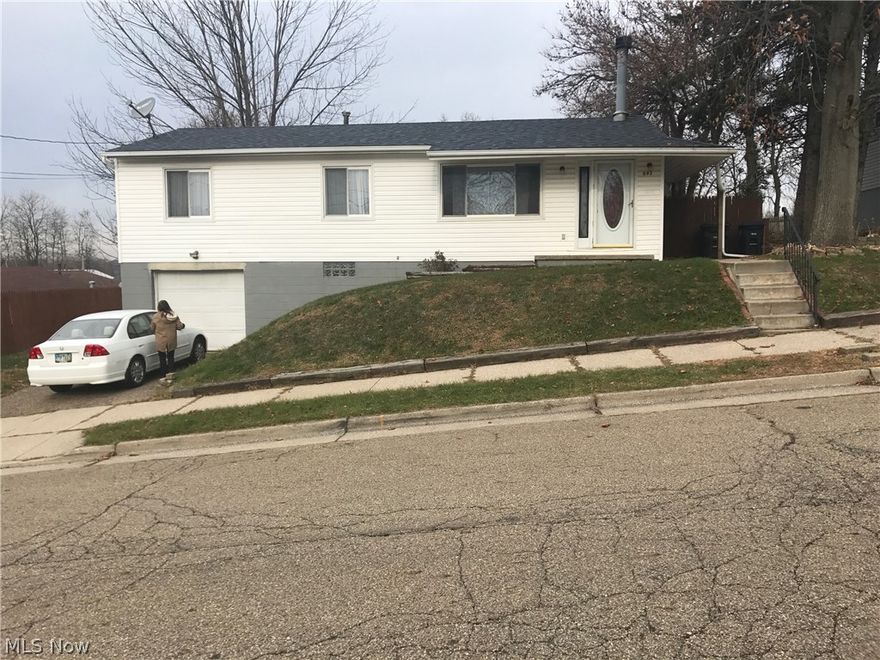 Awesome opportunity to rent a great place in Chapel Hill area! HUGE beautiful deck overlooking a fenced in back yard, perfect to enjoy the summer. 3 BR 1.5 bath 1 car garage, hardwood floors, all kitchen appliances including dishwasher, what more could you ask for! Fantastic location. W/D hookup in gigantic clean, dry basement with built-in bar and walk-out to a 1-car garage. $35/adult application where we screen for eviction, credit, and criminal history. No cats or smoking. $350 water deposit required.