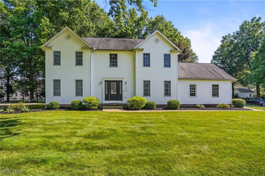Don't miss this 4 bedroom, 2.5 bath colonial in Canfield School District! The new vinyl siding will give you a beautiful Cardinal welcome as you enter into the main foyer. The living room/bonus room has french doors to the attached family room which is open to the updated, eat-in kitchen, complete with stainless and black appliances, pantry, center island, and french doors to the back deck where you will enjoy the partially wooded yard. The formal dining room with chair rail, crown molding, and roman blinds will offer memorable dinners. The 1st floor laundry is conveniently inside from the attached 2 car garage entrance with opposing first floor half bath. The center staircase leads you to 4 bedrooms and 2 full baths, all very neutral as well as sizeable and you will love the walk-in closets and extra storage! Down in the lower level a huge finished rec room will provide the extra space you didn't know you wanted. Also, there is a private office and 2 unfinished storage areas.  With so much to offer, I am proud to help you tour this amazing home. Schedule your tour today!