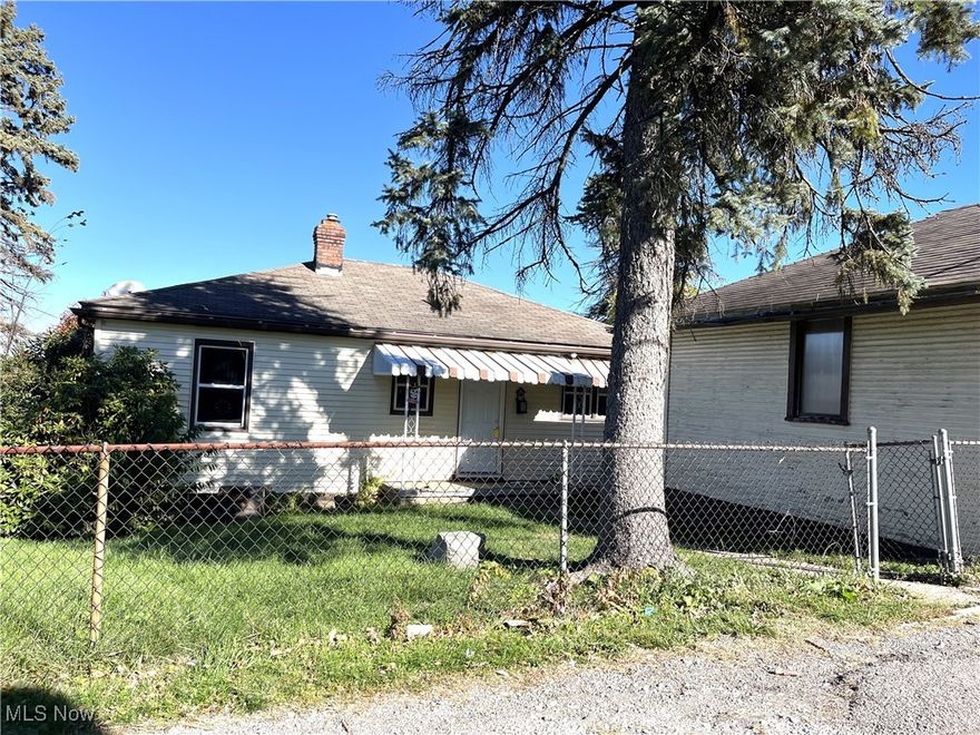 Looking for a place to make your own?  This 2 bedroom, 1 bath home is ready for its new owner to come in & make it their own.  With some TLC this could be the perfect fix!  Full walkout basement with a 2nd kitchen & rec room.  There is a toilet located under the steps coming down into the basement.  There is a shower in the back corner of basement.