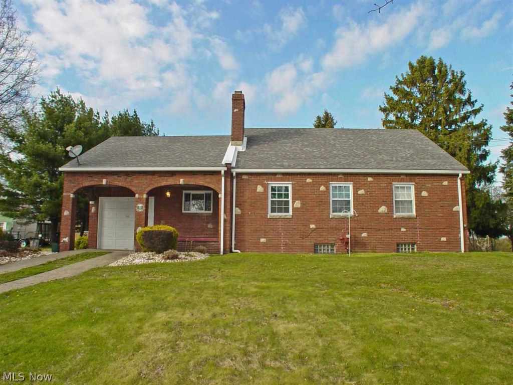 Convenience Plus! 3 BR brick situated on .74 of an acre. Convenient laundry room and garage located right off the kitchen. Hardwood floors in the dining room & master bedroom. Priced right!