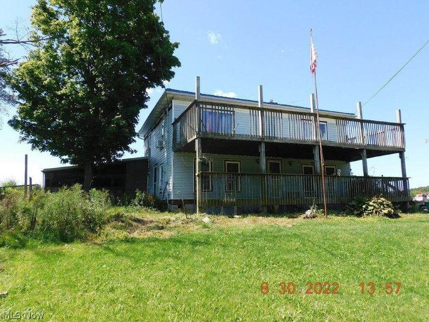 This stately lady located in Lenox Township offers 17.56 acres and a ton of room to roam! This home has tons of space including a large living room, family room, formal dining room and large eat in country kitchen. a full bath and bedroom on the 1st floor and 3 bedrooms and a full bath on the 2nd floor ! the full basement offers the gas furnace with FREE Gas! Step outside and take a stroll out into the back yard and find a newer 40x60 outbuilding with a lean-to which is perfect for your heavy machines, toys or animals, just back a ways from that is another newer 40x80 5 plus stall horse barn, plumbed for water from one of the two large ponds. The first pond supplies water to the home! This property offers trees and creeks and plenty of wildlife. bring your imagination, horses, livestock, goats and chickens or make this home your ultimate playground!