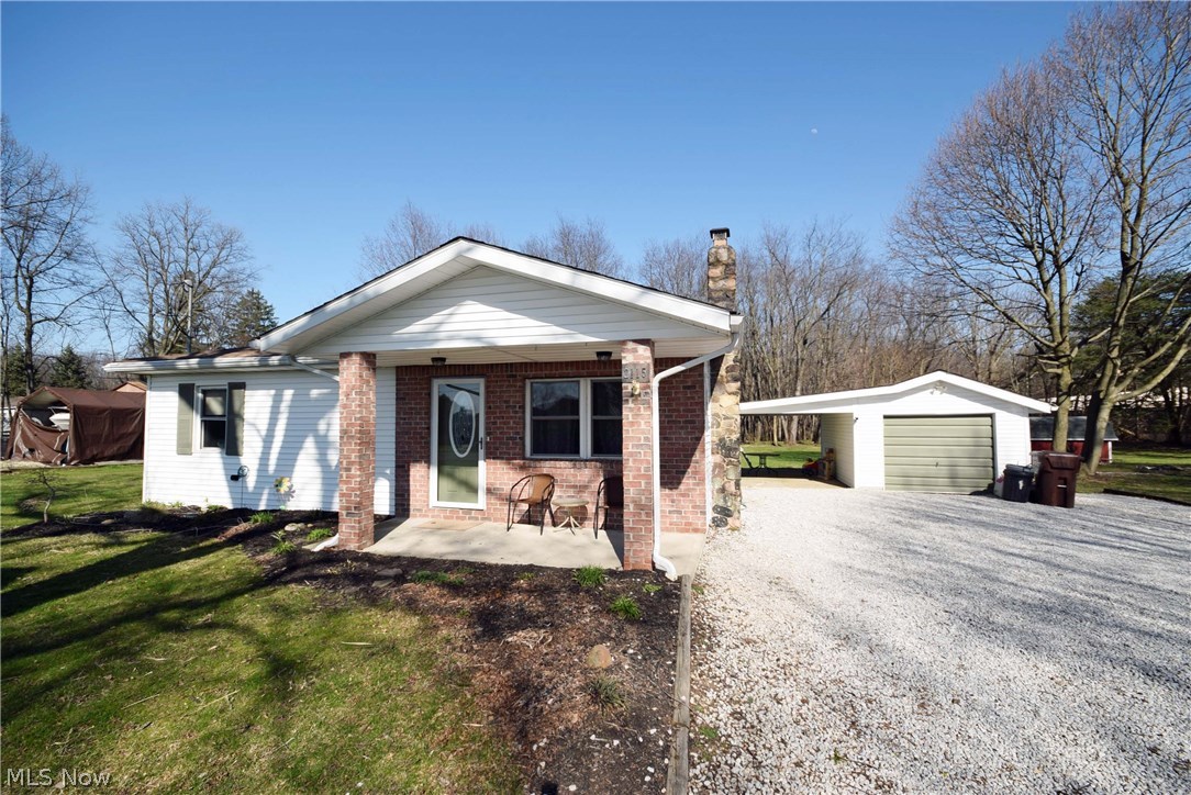 Adorable 2 bedroom 2 full bath home with hardwood floors throughout. Gorgeous stone fireplace in living room, eat-in kitchen, master bedroom with master bathroom and oversized closet off of the bathroom. New Kitchen installed in 2015 and new roof 2016. 1 car detached garage with covered patio and additional storage shed for mowers and tools. Portion of the backyard fenced and overall very spacious backyard with fire-pit. No worries as this house comes with America's Preferred Home Warranty! Don't miss out! Schedule your appointment today!