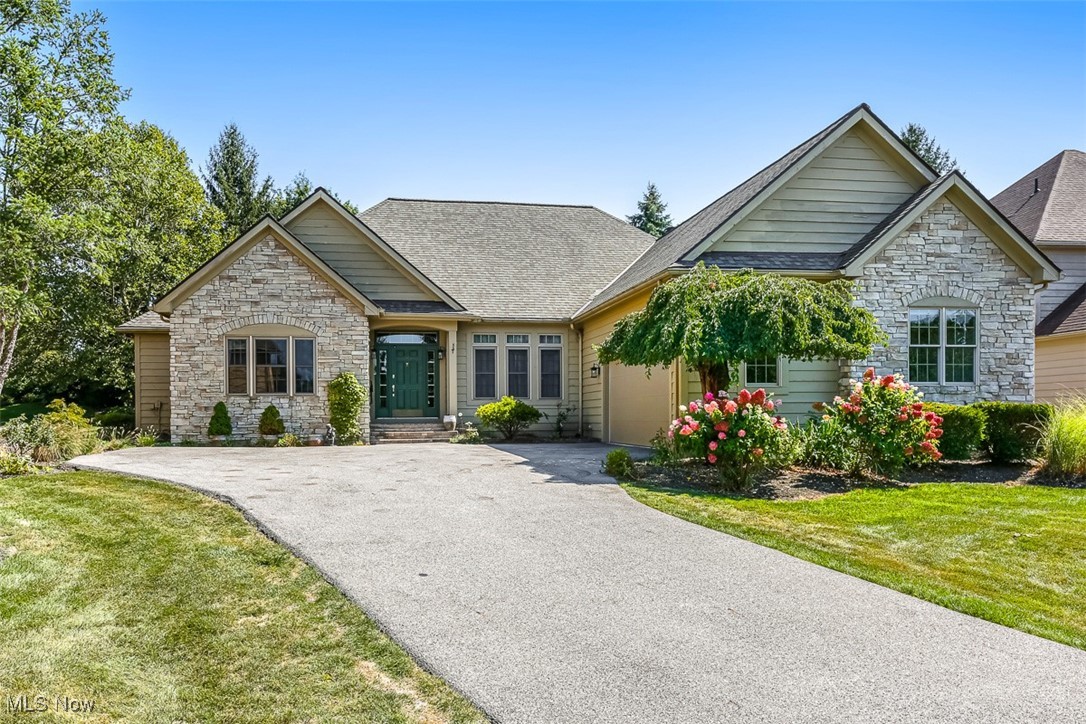 Welcome to this beautifully updated cluster home in the prestigious Barrington Estates, one of Aurora’s most desirable communities. Thoughtfully designed for comfort, style, and accessibility, this ranch offers a seamless blend of modern updates, elegant details, and a functional floorplan that suits a wide range of lifestyles. Featuring 3 bedrooms and 3 full baths, the home is filled with natural light, enhanced by soaring ceilings and gleaming hardwood floors in the main living areas. The inviting entry opens to a formal living and dining space, setting the tone for both everyday living and entertaining. At the heart of the home, the updated kitchen and family room with a cozy gas fireplace create a warm gathering spot. The kitchen boasts crisp white cabinetry, granite countertops, an oversized island, and a sunny dining area with access to the deck—perfect for morning coffee or summer barbecues. The primary suite is a private retreat, complete with a spacious bedroom, separate sitting room with deck access, and two generous walk-in closets. The remodeled ensuite bath is both stylish and functional, featuring a handicap-accessible shower and thoughtful modern finishes. Two additional bedrooms, each with access to a full bath, provide comfort and flexibility for family or guests. Designed with accessibility in mind, the layout offers peace of mind and convenience. The full basement extends your living space, partially finished and ready to accommodate a recreation room, home gym, workshop, or storage. Outdoors, a private back deck with retractable awning overlooks a peaceful yard, ideal for relaxing or entertaining. Updates: Kitchen ’23, primary bath ’25, secondary baths ’24, Roof ’20, A/C ’23, garage door ’22, radon system and more! Barrington Estates offers more than a home—it offers a lifestyle. With the security of a gated entrance and the prestige of an established golf course community, this is truly an exceptional opportunity to move right in and enjoy!