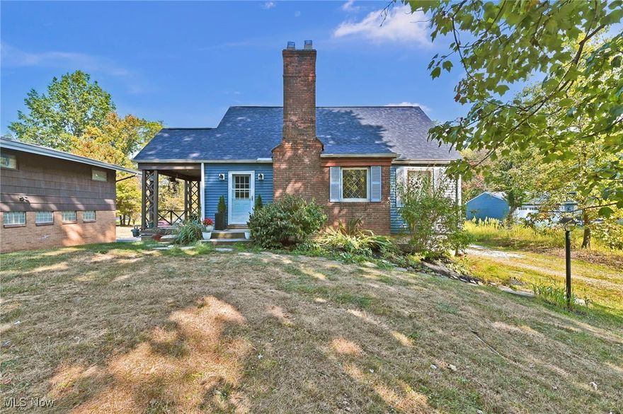 Welcome to this charming 3-bedroom, 1-bath bungalow nestled on 3 picturesque acres in North Royalton. Offering a cozy, cottage-like feel, this home features original built-ins, and a warm living room with a beamed ceiling and fireplace. The first-floor primary bedroom and bath provide convenience, while two bedrooms upstairs offer additional space. 

A walk-out basement adds functionality with laundry and storage. Enjoy relaxing on the side porch or taking in the serenity of your lot! Recent updates include a new roof (2025), new vinyl siding (2025), and a renovated bathroom (2019). Sellers are providing a 1 year home warranty for peace of mind! The pool stays! 

Whether you’re looking for a tranquil retreat, acreage, or the opportunity to make a house truly your own, this property has so much to offer. Home is being sold AS-IS.