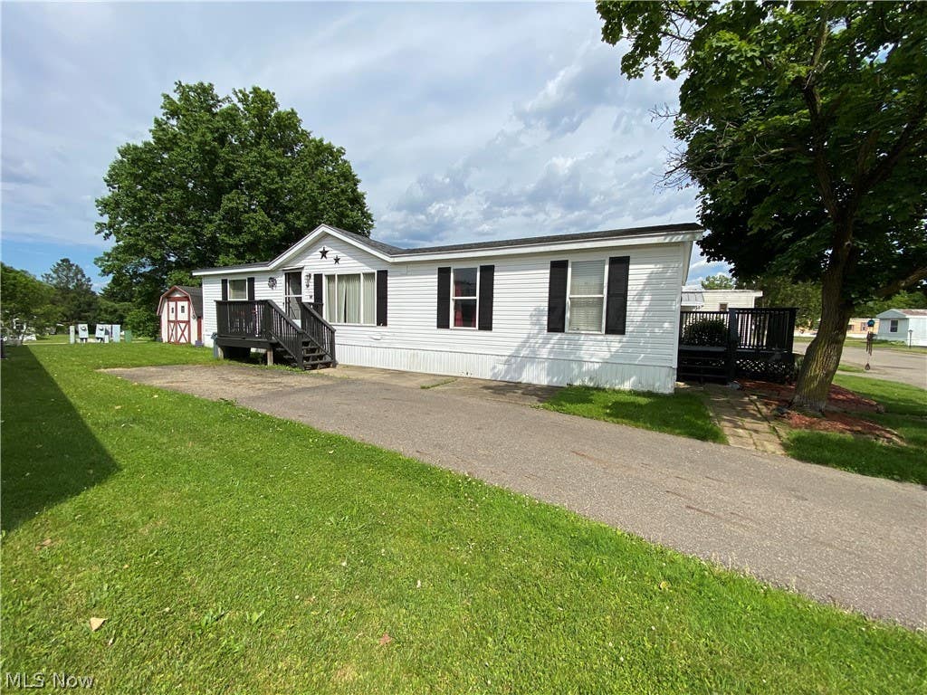 Photo of 150 Rolling Acres Circle W, Massillon, OH 44647 (MLS # 5215084)