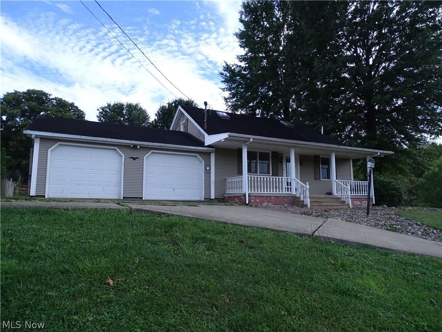 Great country location, less than 5 minutes from St. Marys, with beautiful Middle Island Creek views, this 3/4 BR, 2 bath home has a huge great room with gas log fireplace for large family gatherings, very nice kitchen and dining with hardwood flooring & new appliances, including washer and dryer, and many more updates.  Call to view today!