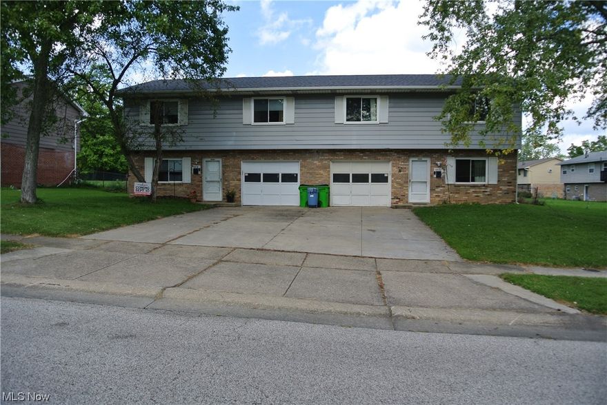 Stow duplex with 2 bedrooms, 1 1/2 baths, 1 car attached garage per unit. Updated unit is currently rented and includes newer kitchen
cabinets, countertop, flooring, updated bath. Roof is approximately (5years old), both furnaces are approximately (5years old), hot water
tank approximately (5 years old), windows approximately (5 years old), kitchen appliances approximately (5 years old). Each unit has a
concrete pad and storage unit. Large fences backyard. Family room, laundry, 1/2 bath with mechanicals and access to garage are on first
floor. Kitchen, living room, bedrooms and full bath are on the 2nd floor. Home warranty included!