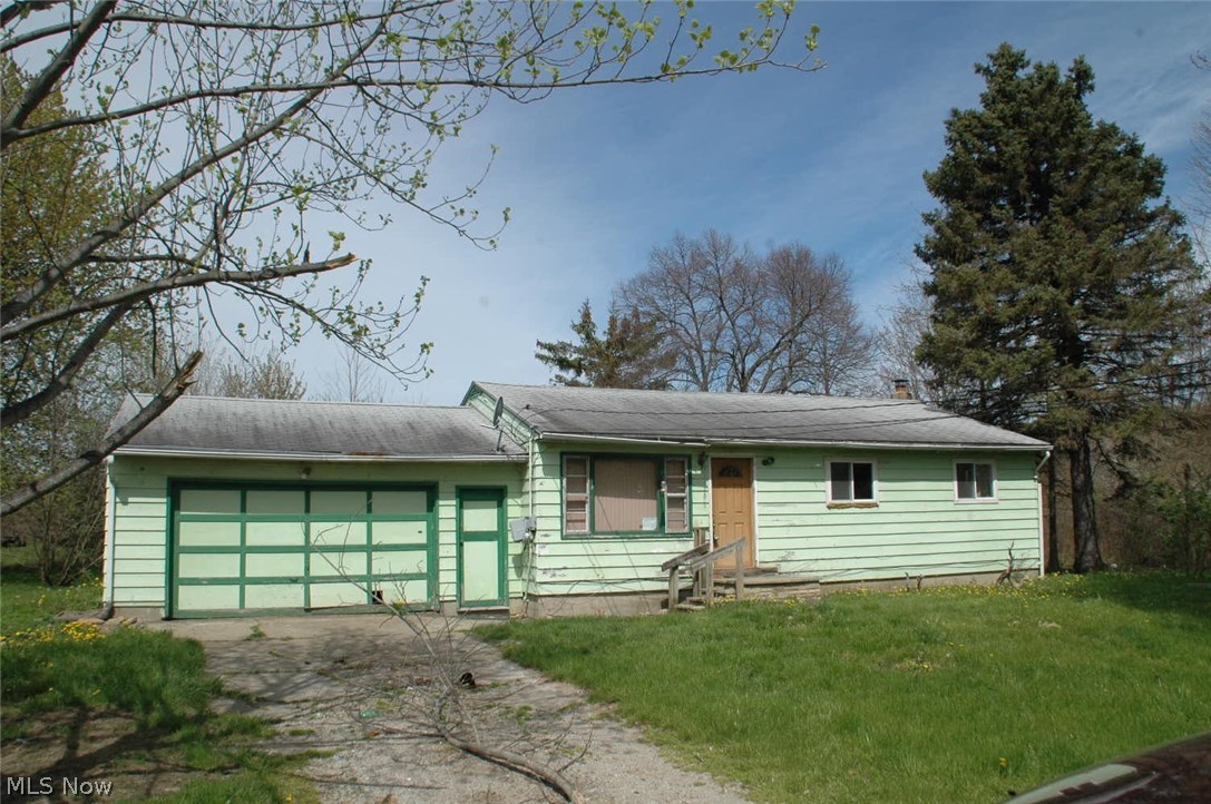 This countrified ranch home is worth looking for with a low, low price. It has 3 bedrooms, eat-in kitchen, living room with hardwood floors. Full basement, and attached garage. Finders-keepers, call today! Property sold as is where is. All information deemed reliable but , not guaranteed. POS and repairs if necessary are responsibility of buyer.