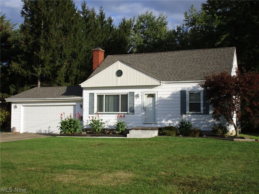 Easy Living in this Boardman Township Neighborhood,  3 Bedroom Cape Cod.  Hardwood Floor in Living Room and First Floor Bedrooms.  Huge Kitchen with Ceramic Tile Floor and plenty of Cabinets and Counter Space.  Living Room has large Picture Window and a Wood Burning Fireplace.  The Finished Second Floor is 31 x 16.  There are replacement windows throughout.  The Full Basement provides plenty of storage, a Shower, and Glass Block Windows.  The Double Attached Garage will provide plenty of space for cars and storage. The Back Patio looks out over a Fantastic Backyard that  is 250 Feet Deep and bordered by beautiful Trees on all sides.  This attractive Home is Vinyl Sided and the new Roof was installed in September of '17.  Invest here and become a proud Home Owner!