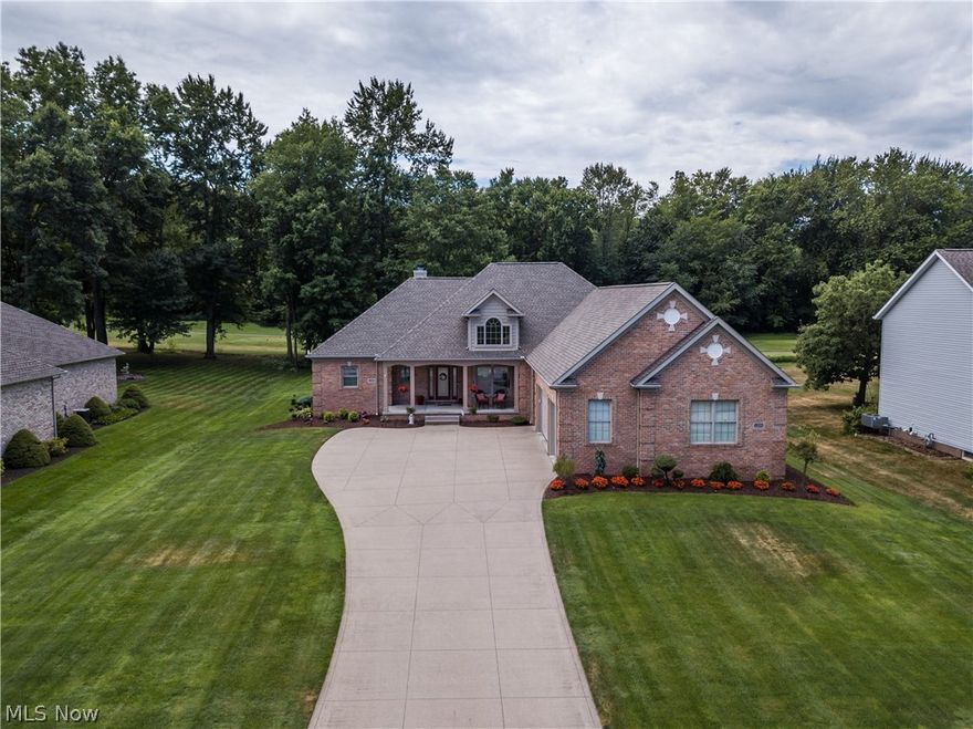 Beautiful custom ranch home, built in 2004, located in Chenoweth Country Club Estates. This home Features 4 beds and 3 1/2 baths. The open floor plan with cathedral ceilings, has gorgeous Brazilian cherry hardwood floors throughout most of the first floor.  The focal point in the great room is a stone, gas log fireplace, with floor to ceiling windows overlooking Chenoweth Golf course that floods the room with natural light. The kitchen features cherry cabinets, Corian countertops, newer Kitchen Aid stainless steel appliances, built in oven, and a breakfast nook with bayed windows. From the kitchen you can walk out to a covered porch and patio that overlooks the 6th tee on the golf course. First floor has three bedrooms and 2 1/2 baths. The large master bedroom, with trayed ceilings and bayed out area, has two separate walk in closets. The master bath includes double sinks, Jacuzzi tub, and a large shower. The finished basement includes a living area, 4th bedroom/or den, full bathroom a