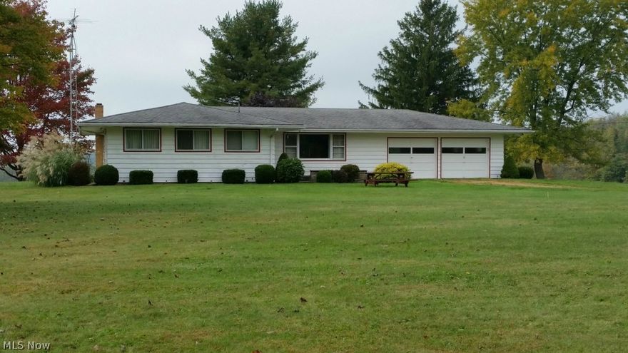 Great location on a slight hilltop with a fantastic view and 4.48 acres.  This nice ranch features a walk out basement, poss family room, and 2 car attached garage plus two 14x24 outbuildings.  Furnace and c/a are about 6 yrs old and roof approximately 15.  Call today for a viewing.