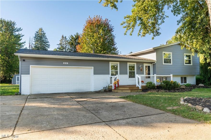 Don’t miss the opportunity to own this beautifully updated 4-bedroom split-level home tucked away on a cul-de-sac! This property offers so many spaces to enjoy the outdoors for relaxing or entertaining. Choose where to spend your time, a spacious new front porch, a large covered patio in the rear, the newly built deck off the kitchen or enjoy a fall evening by the firepit. Step inside to find gorgeous refinished hardwood flooring in the living room, upstairs bedrooms, and hallway. The kitchen has been updated with luxury vinyl tile flooring, cabinetry, granite counter tops, stainless steel sink and light fixtures. Both full bathrooms have been tastefully updated with new tile flooring, sinks, vanities. The lower-level bath has a new shower and the second-floor tub/shower has been refinished. The inviting family room features a wood-burning fireplace, large picture window for natural light, and brand-new carpeting. This move-in-ready home combines comfort, style, and functionality—schedule your private showing today!