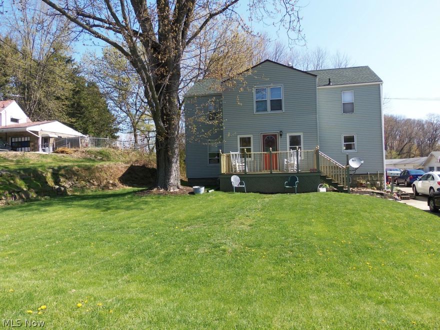 What a great opportunity on this vey well maintained home that is full of character. With over 2,000 square feet there is plenty of room for everyone. Also, a great investment as the home has an apartment on top with an income of $600+ and an in-law suite in the lower level. With the home offering three kitchens, three full baths and four garages, the option is open to use the entire home for your personal needs or you can live in the main home and pull from the income which could cover your house payment....wow live for free!!! The kitchen in the main home is full of character with newer custom glazed cabinetry, a farmhouse sink and hardwood floors. The living room is open to the dinette area and kitchen. The main floor also offers an office and a nice sunroom. The second floor offers an eat in kitchen, living room and three bedrooms. Many updates through the home...some areas like new. Ample parking with your four car garages and two lane oversized concrete drive. Nice deep rear yard