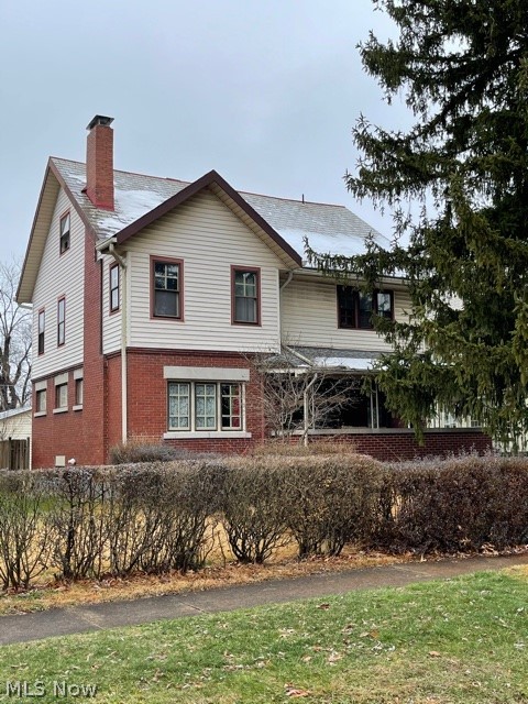 With 4-5 bedrooms and 2 1/2 baths this older historic 2 story home has stunning woodwork throughout the home and gorgeous curved staircase and solid wood pocket doors, hardwood floors, crown molding and baseboards, built in cabinets, coffered ceilings are loaded with character throughout. Several fireplaces, sunlit windows, updated eat in kitchen with pantry and formal dining room, large spacious rooms, updated full bath, back staircase from the kitchen leads upstairs to a private 5th bedroom and partially finished attic area. Off street parking and 2 car garage and level backyard with courtyard area for relaxing, covered front porch are all a must see in this fabulous home. So call today to schedule your showing.