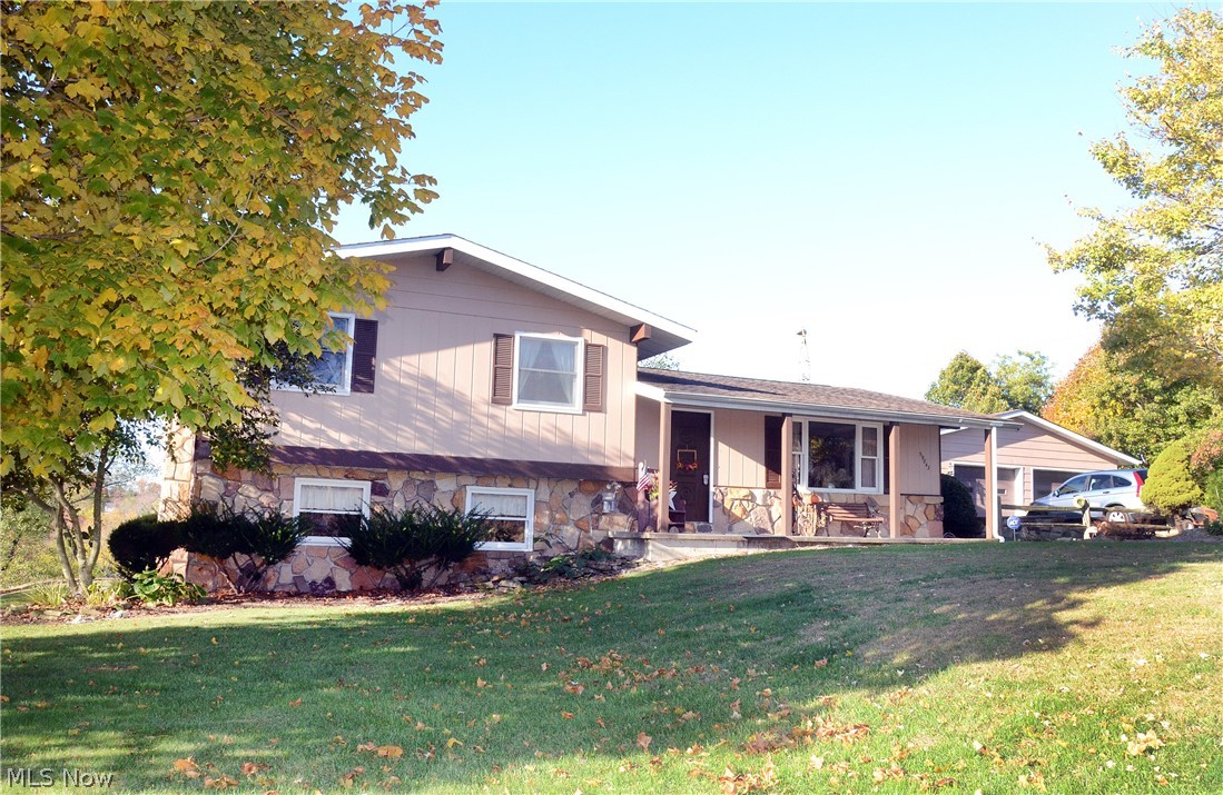 The first thing you'll notice about this property is it's absolutely lovely setting. Just over an acre with great view of wooded back yard & brick paved patio. Multi level house has 3 BR's & 1.5 BA's. All electric & fully equipped kitchen. Detached 2 car garage. Your special place!