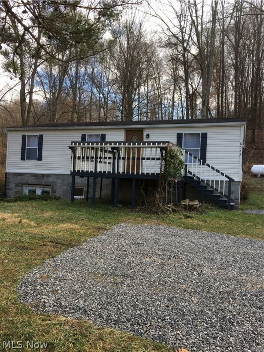 Very nice totally remodeled home - New doors throughout with house frames. Fiberglass front door, new flooring throughout (carpet and laminate), new stainless range and refrigerator. New stainless convection microwave. Front and back decks. Both bathrooms. 12x20 storage building - totally remodeled - kitchen has new cabinets and counter tops. New lighting - walk out basement has new French doors and steps. New hot water tank, will be hooked up after well is clean and working. New Pex waterlines throughout. New hot water heater, new water pump and holding tank. Septic cleaned 11-2-2016. Seller is selling home "as is". Seller is Retaining all Mineral Rights. Also Parcel # 18-0000695000