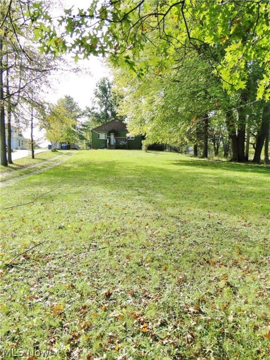 Enjoy many possibilities for use on just over an acre of property in Tallmadge! With garage space for 3 vehicles and plenty of room for outdoor entertainment, there is a lot of value packed into this property. The home is being sold in AS-IS condition, and features ranch style living, including a first floor laundry room. All appliances stay, and the new buyers can fix up the home cosmetically while they live in it. There is even plumbing for another bathroom in the basement. Come out and view this property to envision how you can make it your own!