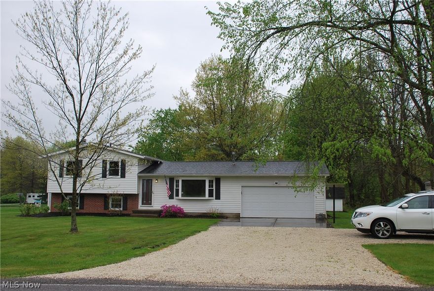 Absolutely gorgeous remodel! All new kitchen, bathrooms, fixtures and flooring. This breathtaking split level home is located on a very large lot perfect for outdoor fun and relaxation. Also features a basement bonus room. You won't want to miss this one!