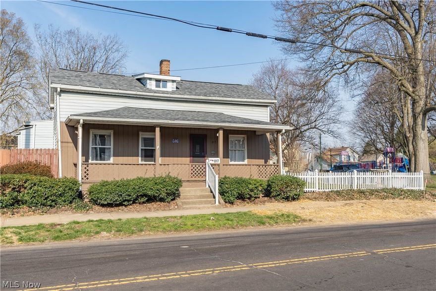 Thoughtfully updated two story bungalow! A cozy layout with first floor living functionality. Impressive outdoor area with covered porch, shed, privacy fenced back yard, and tons of parking/storage space outside. The sliding glass door takes you to the newly renovated kitchen with appliances that stay with the home. The renovated bathroom is off the kitchen. Main floor laundry. The owners suite is also on the main level & has a accent wall. Spacious Living room on main level, too. The upper level has two bedrooms, and an additional full bathroom. One upstairs bedroom is designed as a "bed and breakfast" and is ideal for guests or visitors. BONUS: The home is zoned as commercial so there's potential for a business to be operated out of the home, or for a small structure to be built on the side yard.