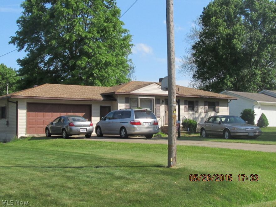 Basement is totally finished,laundry room has access to garage, full bath in basement, fenced yard, storage shed, sun room with sky-lites, cul-de-sac street