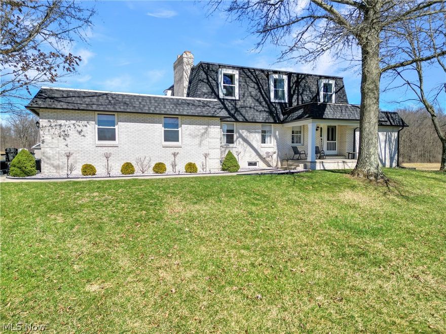 HUGE PRICE REDUCTION! Welcome to this 19-acre private lot with mature trees and open land sitting far off the road—perfect for outdoor enthusiasts, hobby farmers, or anyone seeking space and tranquility. Home has been Completely Renovated with Quality Workmanship! Stately brick exterior with timeless curb appeal. 2 car attached garage. There are 2 First Floor bedrooms and 1.5 baths. 2nd Floor showcases 3 bedrooms and 2 full baths. Multiple fireplaces—one wood-burning in basement and two gas on each floor for cozy evenings throughout the home. Absolutely a Lovey spacious kitchen and dining area with ample counterspace, cabinetry and breakfast bar. Clean walkout basement. Amazing 7,700 Sq foot building that showcases an in-law suite, heated shop area with vaulted ceilings and barn with 3 horse stalls. Offering ample room for horses, livestock, equipment, or workshop needs. Enjoy peaceful rural living with quick access to US-422, offering easy commutes to Cleveland, Warren, and Youngstown. Call for more information about such an impressive property!