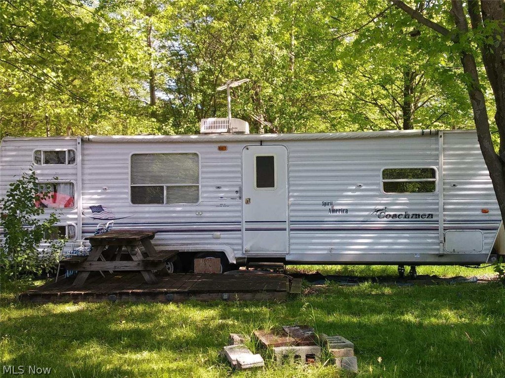 Located in Holiday Camplands is a 2003 Coachman Limited Edition, needs some TLC. There's a 8 x 12 deck & an 8 x 10 shed. Lots of amenities in this gated community. Please see attached fact sheet.