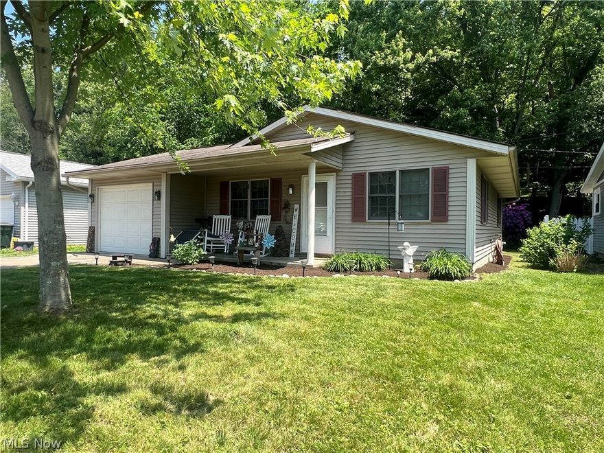 Convenient one story living!  Charming 2 bedroom ranch home.  Spacious rooms with eat in kitchen.  Main floor laundry.  Walk in closet in the master bedroom.  200 amp electric.  1 car attached garage.  Private backyard with large rear patio, perfect for relaxing or entertaining.  Exclude hot tub, washer and dryer.  May require flood insurance.