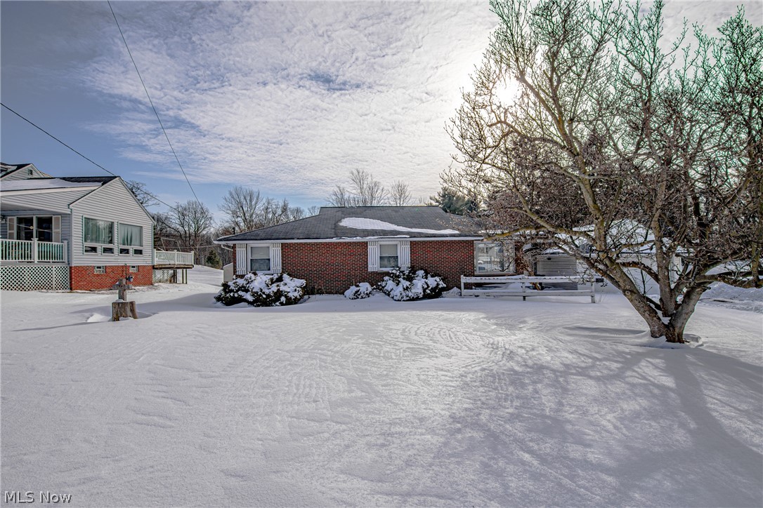 Brick ranch located in Southern Parma with 1.6 acres*20x14 Living Room with wood burning fireplace*Newer hot water tank* All appliances stay* Nice size walk up attic *Cedar closet on the first floor *2 car garage* Central Air *1427 Sq. Ft.