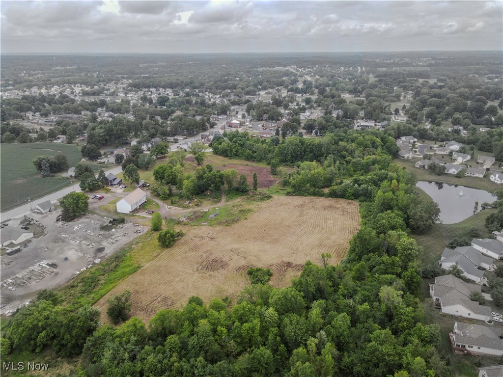 What an opportunity to buy 17 acres in a great newly developed area in North Canton/Lake Township. Water, sewer, gas and electric are available! Partially wooded but mostly cleared. Bank barn on the property is in great shape and also a home is on the property. Currently zoned Office Research and R-2. Sewer runs through property.