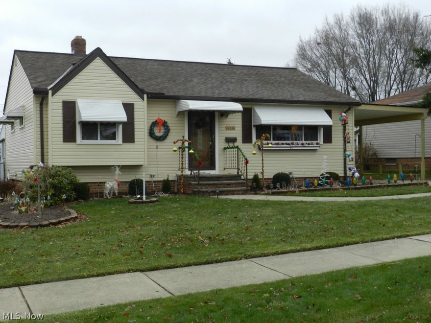 Spring into this ready to move-in, three bedroom, Brook Park Ranch. Situated near transportation, schools, interstate highway access, medical and recreation facilities, this charming ranch boasts new vinyl siding, roof and gutters (2014), and newer kitchen. Basement sports a large carpeted recreation room to facilitate your entertainment events.  Also you will find wet bar and second bathroom in addition to laundry and tool room. Enjoy enclosed three season patio with sliding glass doors. Fenced backyard makes for perfect play area for children and pets. Sellers have provided home warranty. City of Brook Park Point of Sale inspection completed; VIOLATION FREE.