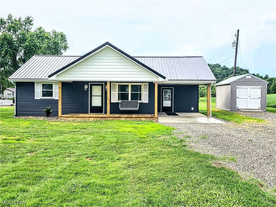 Check out this newly remodeled, ranch home in a quiet country setting.  This darling abode is nestled on a flat 2.25 acres in Meigs County, OH.  Enjoy the convenient access of one floor living with 2 bedrooms, 1 bath, and large laundry/mud room.  The master bedroom has a spacious closet and en-suite access to the full bath.    Spend countless hours on the new front porch taking in sunrises, sunsets, wildlife, and nature's beauty.  A new 16' x 10' shed provides extra storage options and the carport has a freshly poured concrete pad.  Many other upgrades include a new metal roof, siding, HVAC, lighting, 200 amp service, cabinets, windows, bathroom vanity, toilet, faucets, and fresh paint.  Only minutes from town and Southern High School.  This property has endless opportunities and plenty of land for expansion.  Don't miss this opportunity to be the new owner of this charming turn-key home!
