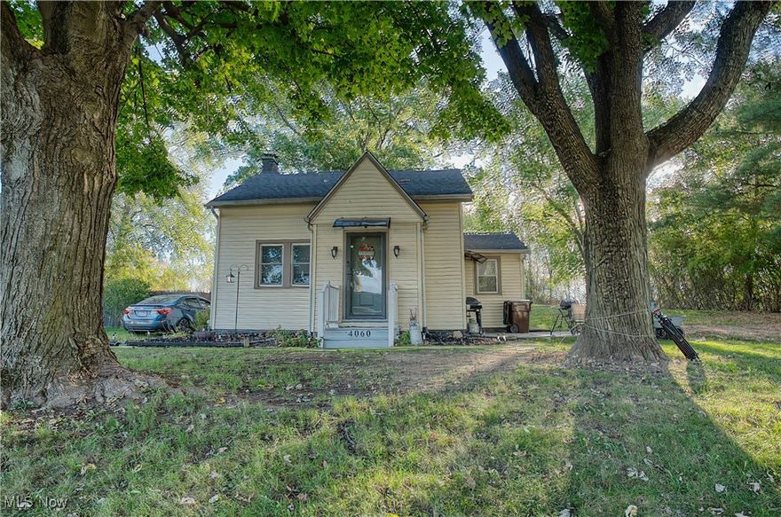 Welcome to 4060 Hambleton Ave NE — a charming 2 bedroom, 2 bathroom bungalow with plenty of character and a super convenient location! With just over 1,000 sq. ft. of comfortable living space, this home is perfect for first-time buyers, those looking to downsize, or anyone who wants an easy-to-maintain home with great value.

Step inside and you’ll love the bright, welcoming living room — a great spot to relax after a long day. The kitchen offers plenty of cabinet space and connects nicely to the dining area, making mealtime easy. Both bedrooms are a good size, and having two full bathrooms is a huge bonus you don’t always find in a home like this.

Outside, enjoy your morning coffee on the cute front porch or spend time in the spacious backyard, perfect for a garden, pets, or backyard BBQs. A 1-car detached garage provides convenient parking or extra storage.

Tucked away in a quiet neighborhood, this home is still close to schools, parks, shopping, and restaurants — everything you need is just a few minutes away!