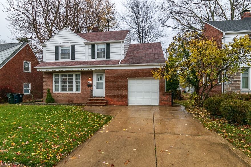 Move right in to this charming colonial with 3 bedrooms, 2 full baths, central air, 1 car attached garage and fenced backyard. Enter into the living room with wood burning fireplace, large front window, laminate flooring, coved ceilings, and neutral paint. The dining room connects and flows with same flooring, charming built-in and attaches to the kitchen as well as the added on family room. Family room has carpet, tons of natural light with surrounding windows and sliding door out to the large backyard with patio, shed and motion sensor lights. The kitchen has same laminate floor, pantry space, brand new fan/light, newer '21 dishwasher, double sink with garbage disposal and all appliances stay. Upstairs you'll find the extra large master bedroom with walk-in closet and attic access, plenty of natural light and hardwood floors under the carpet. Two additional bedrooms, one with a bonus cedar closet and the other with a walk-out to the flat roof. Linen closet and a full bathroom with tub/shower round out the upstairs. The basement has a partially finished rec room with 2016 nature stone floor, glass block windows and studs ready for new drywall. The unfinished side has plenty of storage space, laundry area and utility sink, approximately 5 yr old washer and dryer stay. Don't miss the other full bathroom with walk-in shower in the basement! Updated GFCI outlets and new ceiling fans in 2023, New hot water tank in 2021. Arlo doorbell camera stays. You do not want to miss this one!