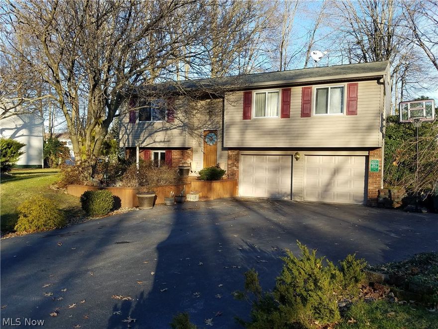 Welcome home to this fantastic, move-in ready home located in a great Cortland neighborhood.  This home has been completely redone over the last 10-12 years both outside and in. The upstairs features a newer kitchen with stainless steel appliances, custom backsplash and new floors. The bathroom is new as well. Downstairs you will find a custom bar and family room and a new half-bath.  The hallmark of this great home however is the back yard. The custom built deck overlooks a beautifully landscaped and fenced yard.  There is plenty of room for the kids to play or to entertain friends. Relax on the deck and listen to the trickle of your very own waterfall and stonelined pond.  The owners are also offering a home warranty for your peace of mind!
