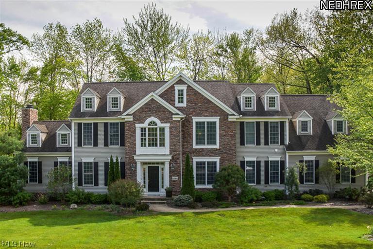 Stunning 4/5 bedroom 4.2 bath Colonial located in prestigious Canterbury. Two story foyer with hardwood floor and winding staircase. French Doors lead to handsome library with custom Cherry built-ins. Formal Dining Room with more hardwood floors opens to the magnificent cherry kitchen w/ granite counters, center island , top of the line appliances, hardwood floors and a walk in pantry. Cathedral Family Room and Sun Room open to the Kitchen making this a spectacular open floor plan for entertaining. Bonus family room, first floor laundry and mudd room with built in cubbies plus 2 half baths complete the first fl. Stunning Master suite with master bath features two walk in closets. A bdrm suite with its own bath and two more bdrms share a jack and jill bath on the second floor. Professionally finished LL with walk out to garage, wine room, bedroom, full bath, exercise area and recreational space. Deck overlooking beautiful wooded lot.
