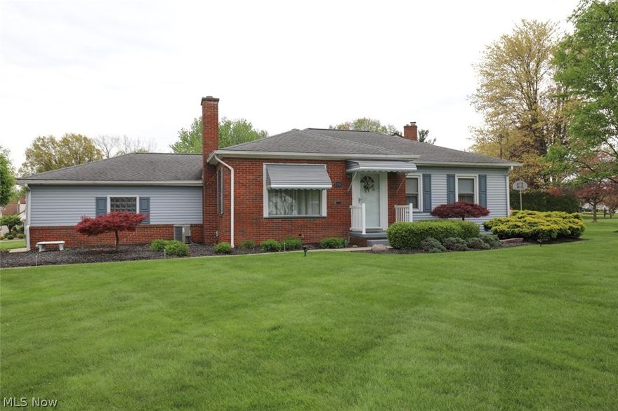 Absolutely Adorable 3 Bedroom RANCH Home with Awesome Porch leading to a Private, Partially Fenced Backyard.  Home Features Include:  Large Front Living Room with Stunning Hardwood Floors & Wood Burning Fireplace with Gas Starter, Awesome Back Family Room with tons of  Windows, Custom Country Kitchen with newer appliances, 3 Large Bedrooms, & Updated Full Bath.  Lower Level Features a Large Rec Room, Laundry Room, & 1/2 Bath.  Enclosed Porch  leads to the Private, Partially Fenced Back Yard.  Front & Back Yards have been Professionally Landscaped.  Home has been very well cared for and updated.  Updates Include:  New Furnace - 2014, New AC - 2014. New Roof - 2004. New Windows - 2002.  Updated Bath - 2010.  Glass Block Windows in Garage - 2014.  Newer Vinyl Siding.  New Drive - 2007.  New Front Screen Door & Front Door - 2013.  New Back Fence - 2012.  New Awning - 2001.  & Waterproofed Basement - 2001.