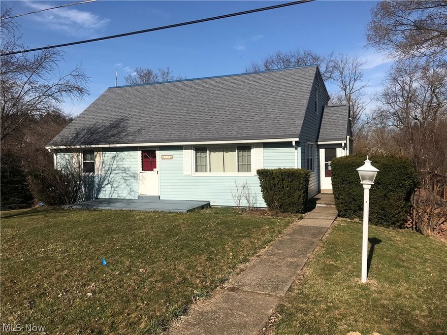 You will love all the space this four bedroom, three bath home has to offer.  Two bedrooms and a full tiled bath on the first floor, two large bedrooms and a full bath with double sink on the second floor.  Family room, laundry and third bath basement level.  You don't need 4 bedrooms? Convert the smaller first floor bedroom into laundry or master bath and walk in closet.  Total kitchen remodeled in 2008 with Beautiful Amish built Oak kitchen cabinets and island with pull out shelves and appliances.  Enjoy sitting out on the deck with a sun setter awning looking out at nature while you are just minutes away from two major highways State route 7 and state route 22.  Two car garage with extra tool room, electric garage opener.  Large 21 X 14 basement family room, walk out door to patio and 3/4 bath.  All new vinyl double insulated tilt in windows in Oct. 2005 with lifetime warranty.  Storage available in the attic. Gas/hot water heating system with a new efficient furnace and central air