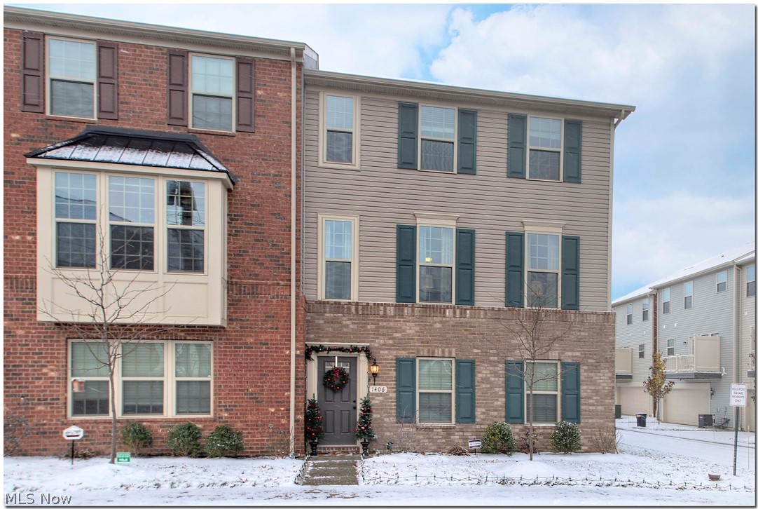 Beautiful townhome in the highly sought after Rockport Community! Sellers are relocating making this an incredible opportunity for you! A true corner unit with views of Cleveland from the 2nd BR, and a ton of natural light throughout! The condo features 3 BR and 2.5 baths with modern living in a wonderful neighborhood! Walk into this townhome from your 2 car attached garage & into the spacious living room. An open floor plan welcomes you with a large dining area, & huge kitchen. Plenty of upgrades were chosen for this home including a 4ft extension to the home walking out to a balcony overlooking the courtyard. The kitchen has modern hardware & an elongated subway tile backsplash, a great sized island & plenty of counter & storage space. A half bath on this level makes entertaining a breeze. The upper level of the townhome includes a master suite, a huge walk-in closet & 5 piece bath including a glass enclosed shower, double vanity & soaking tub! The Master BR has also been extended in