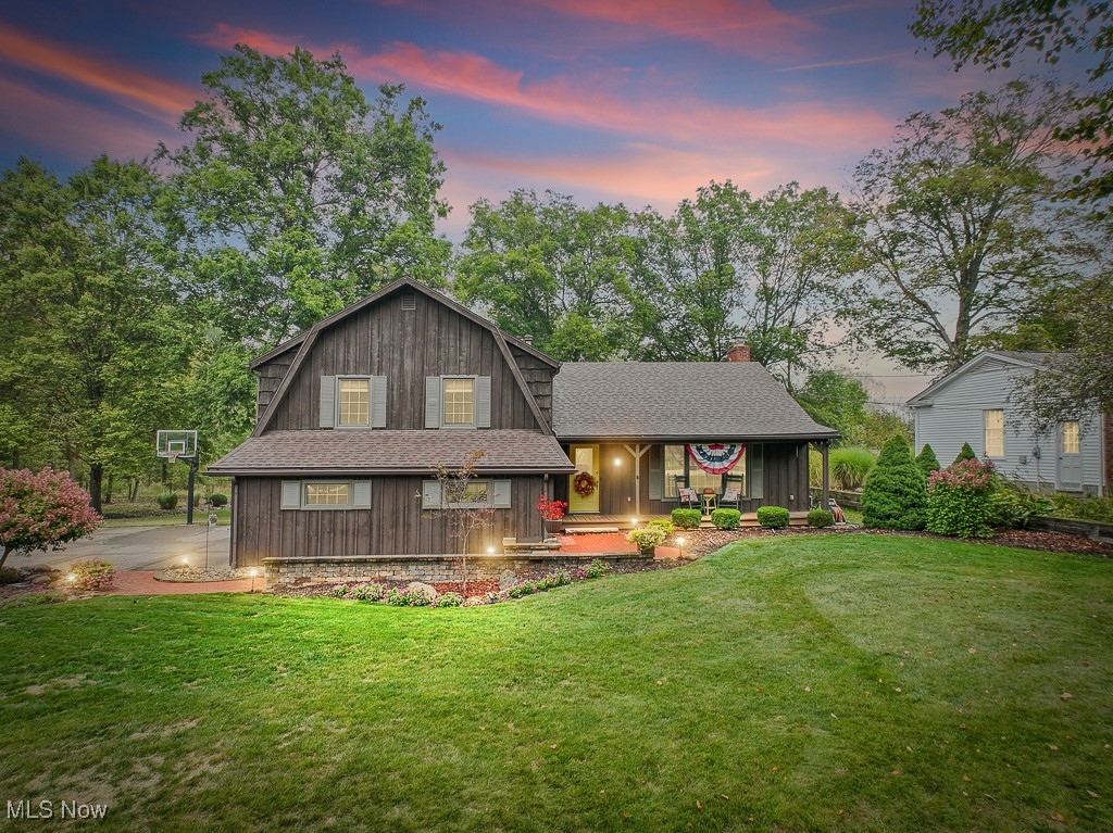 Welcome to 313 Whittlesey in Tallmadge – a stunning split-level home offering over 2,200 sq. ft. of beautifully updated living space in one of Tallmadge’s most desirable neighborhoods. This fully remodeled 3-bedroom, 2.5-bath residence is truly move-in ready, with exceptional upgrades inside and out.
Step onto the inviting covered front porch and inside to a bright foyer filled with natural light and gleaming hardwood floors. The main living room impresses with recessed lighting, crown molding, and a large picture window overlooking the front yard.
The gourmet kitchen is a chef’s dream, featuring custom cabinetry, granite countertops, a stylish tile backsplash, Sub-Zero refrigerator, dual-fuel GE Café range, and a center island with seating. Open to the dining area, the kitchen also showcases exposed wood beams, built-ins, and a cozy fireplace – perfect for everyday living or entertaining.
Multiple living spaces make this home truly versatile. A spacious family room offers built-ins, charming window seats, plush carpeting, and a second fireplace. Another family room off the dining area boasts soaring ceilings and direct access to the two-tiered deck, ideal for gatherings and summer barbecues. A convenient half bath completes the main level.
Upstairs, the owner’s suite includes a walk-in shower and granite vanity. Two additional generously sized bedrooms share a beautifully updated full bath with a spacious vanity.
The finished lower level provides a large recreation area with endless possibilities – game room, media space, or home gym.
Immaculate landscaping enhances curb appeal, while peace of mind comes with extensive updates: new HVAC, furnace, AC, and Aprilaire (2024), freshly painted exterior (2025), newer windows, and roof replacements on both the home and storage barn (2020).
Every detail has been thoughtfully designed and meticulously maintained – all that’s left to do is move in and make this remarkable property your own.