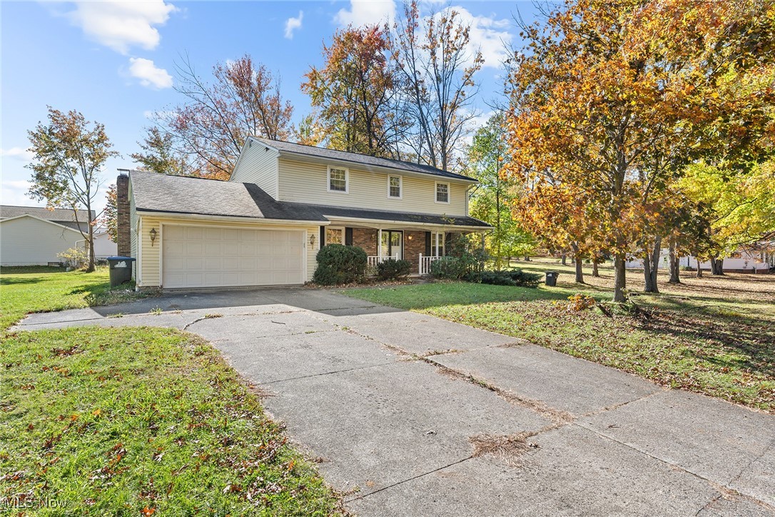 Bring your vision to life in this spacious fixer upper with great bones and endless potential.  Inviting classic colonial layout with a large living room, formal dining room, eat in kitchen, and cozy family room boasting a fireplace and backyard access.  A convenient half bath and garage access finish the first floor.  Upstairs you'll find a large primary suite with a private bath and walk in closet.  Guest bedrooms all with great closet space, including another walk in closet! Hall bath offers good counter space to complete the second floor. Full basement with a large rec room, additional bonus room and great storage! Nicely sized yard with mature trees.  Some new mechanicals including a newer furnace and AC, new stainless gas stove and new washer and replacement windows throughout. This property is ready to be reimagined and priced to sell!